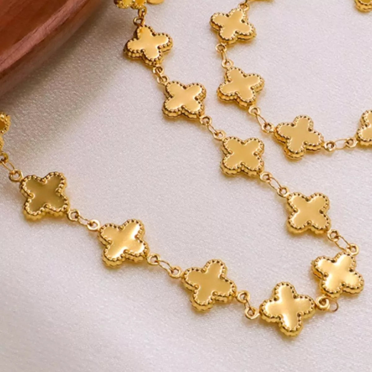18K Gold-Plated Clover Charm Necklace featuring elegant clover links in a stylish design perfect for everyday wear.