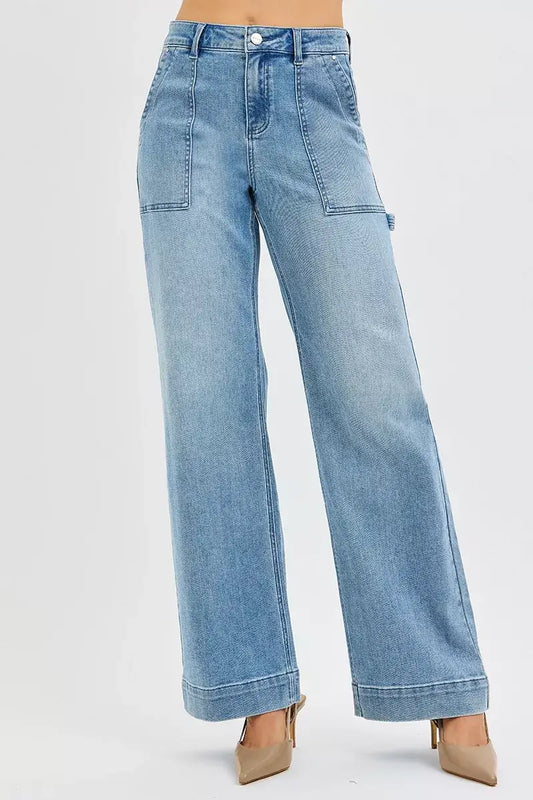 RISEN High Rise Straight Leg Jeans Plus Size in light wash with front pockets, perfect for casual styling.