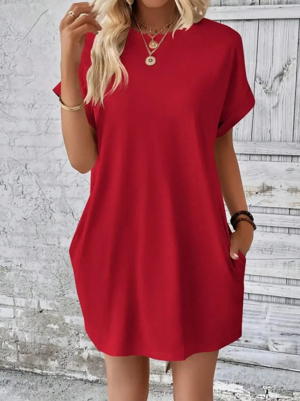 Stylish red pocketed round neck short sleeve dress, perfect for casual wear and comfort.