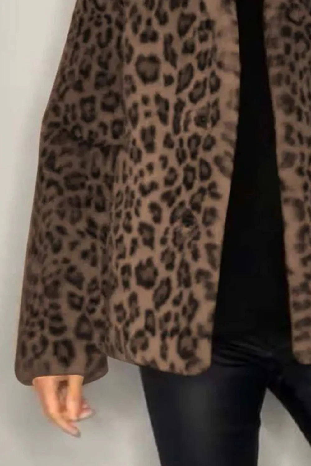 Full Size Leopard Furry Collared Neck Long Sleeve Coat displayed on model, showcasing its stylish leopard print design.