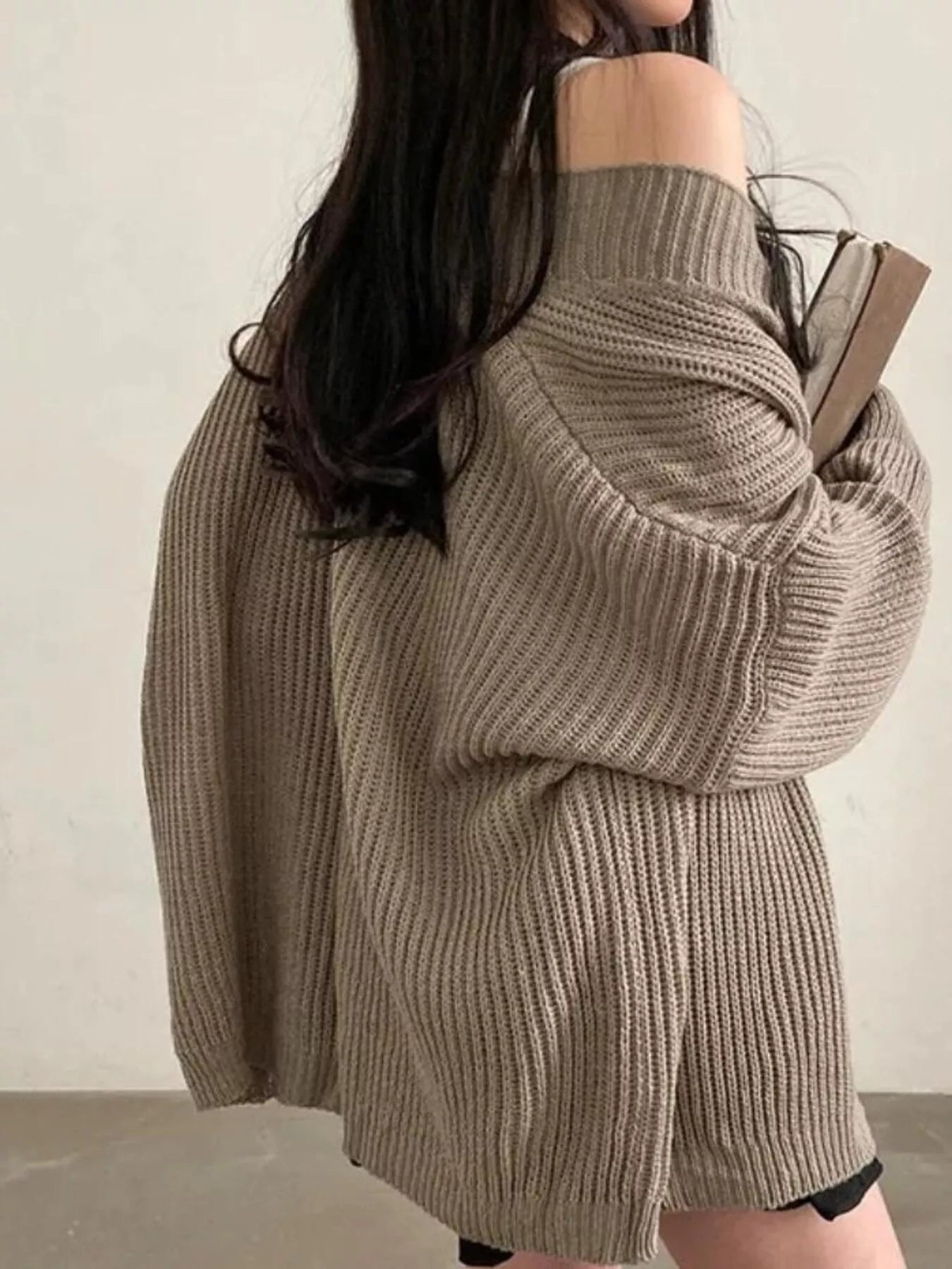 Open Front Oversized Knit Cardigan for Women in a soft beige color, showcasing its oversized and slightly stretchy design.