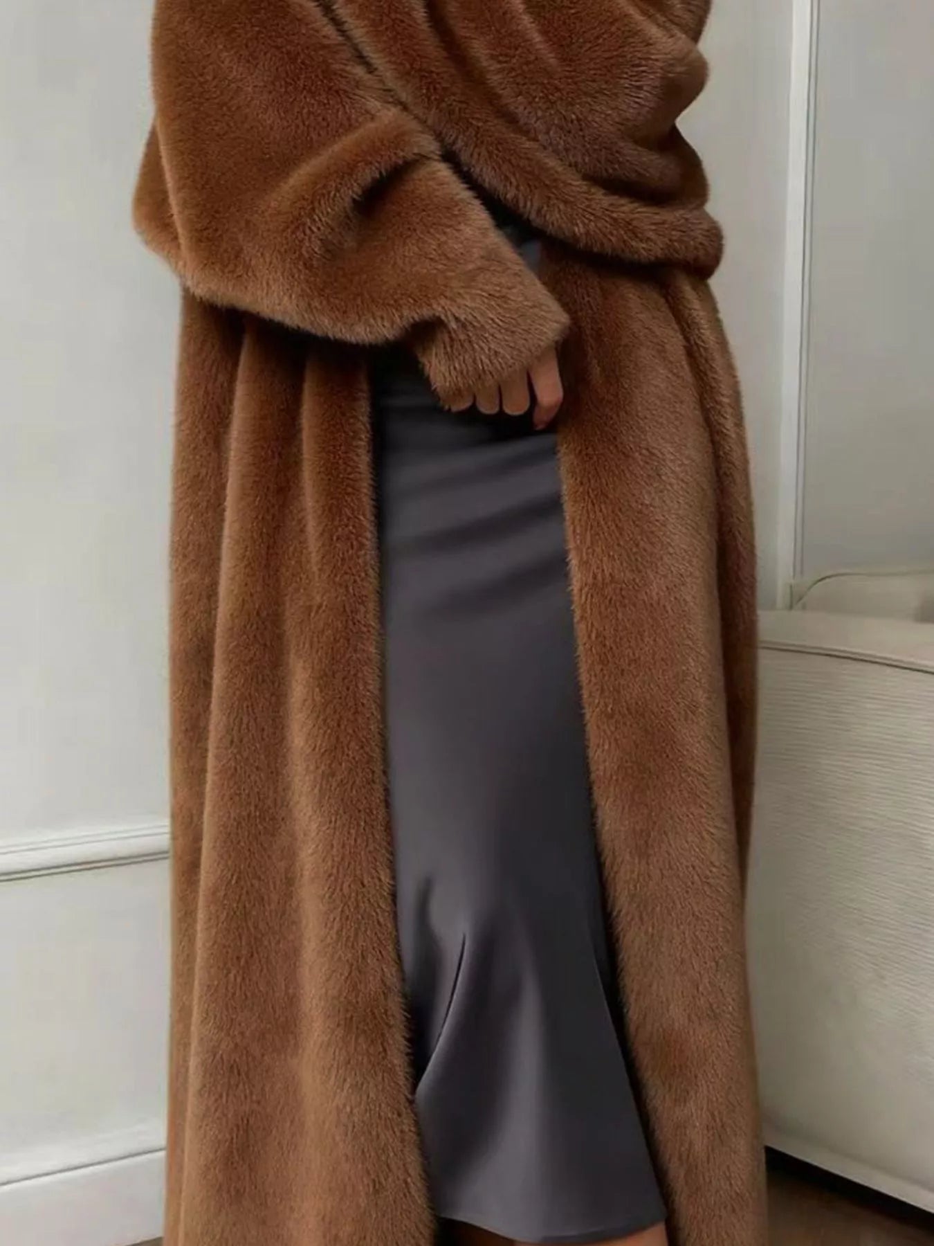 Fuzzy Open Front Longline Cardigan worn over a sleek gray dress, showcasing its soft material and cozy design.