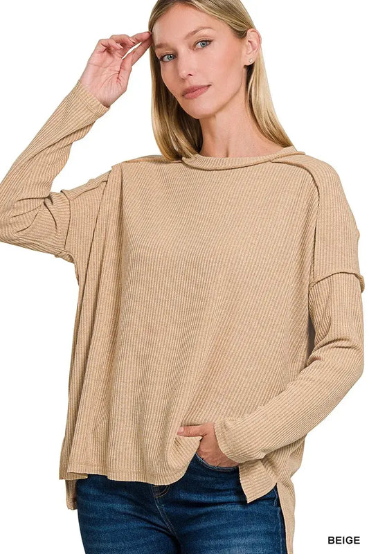 Zenana Ribbed Drop Shoulder Round Neck Sweater in beige, featuring a relaxed fit and dropped shoulder design.