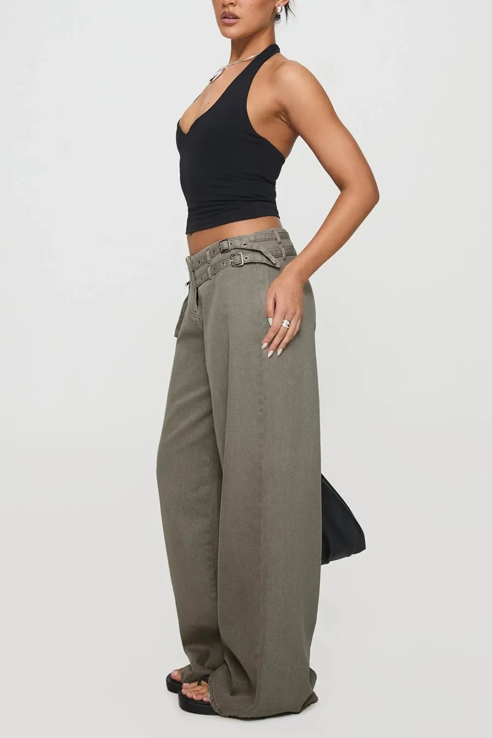 Wide Leg Jeans with Pockets styled for comfortable everyday wear, featuring a model in a black top and chic wide-leg jeans.