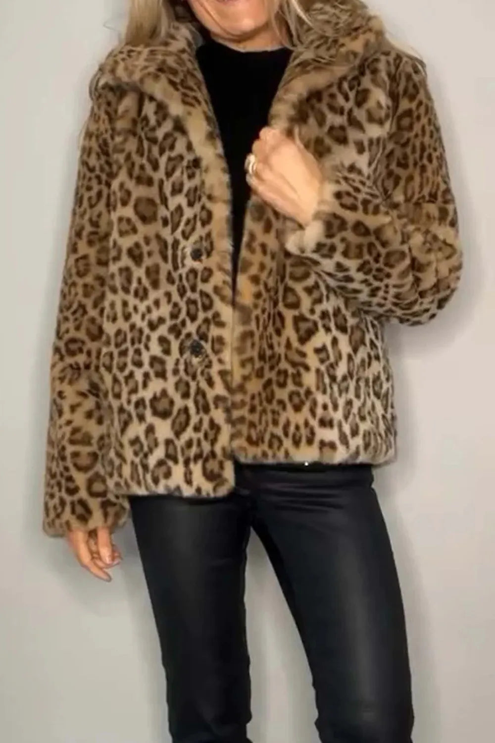 Full Size Leopard Furry Collared Neck Long Sleeve Coat worn by a model, featuring a stylish leopard print design.