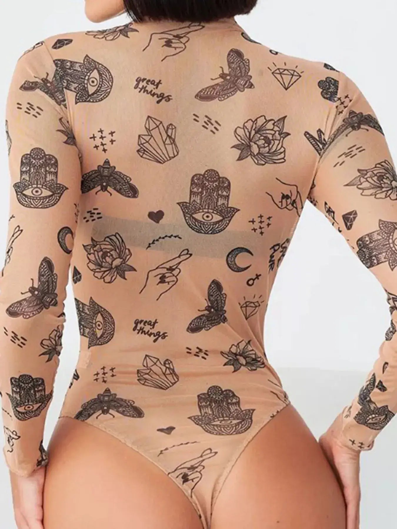 Printed mock neck long sleeve bodysuit featuring sheer stretch fit with stylish tattoo prints.