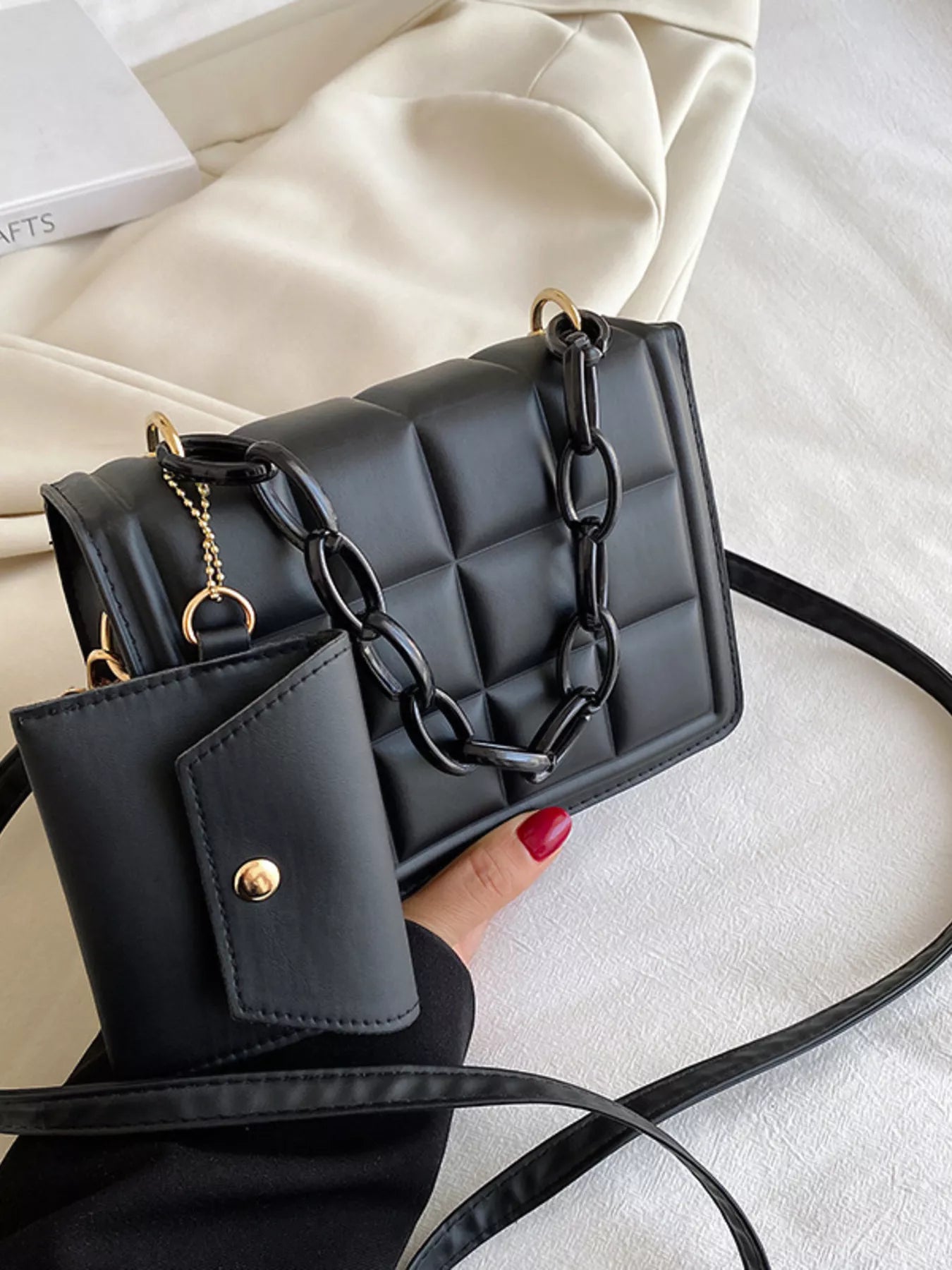 Quilted Chain Strap Crossbody Bag shown in black PU leather with chain detail and mini wallet, perfect for stylish outings.