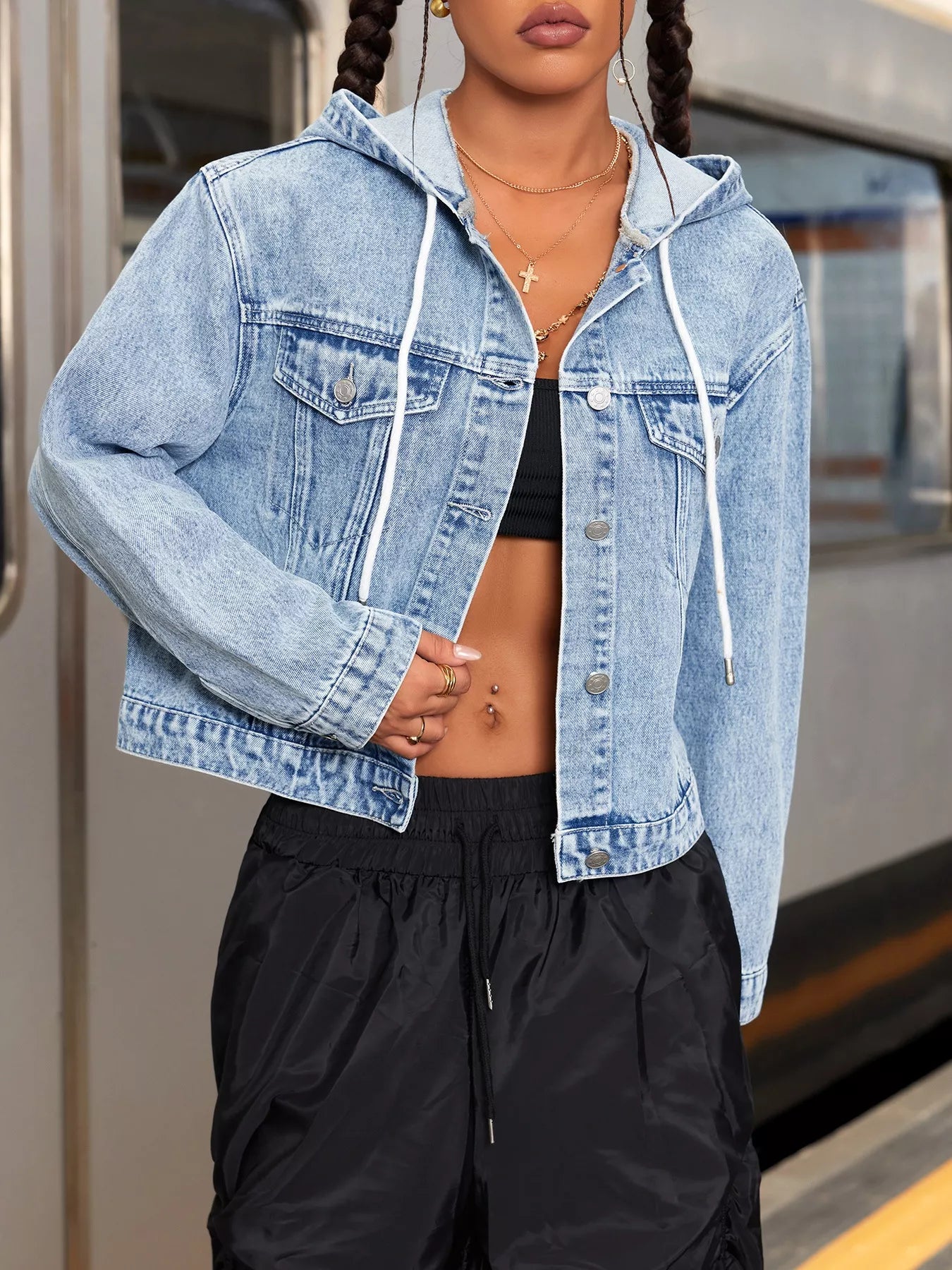 Hooded Drawstring Cropped Denim Jacket for Women showcased in urban setting with stylish layering.