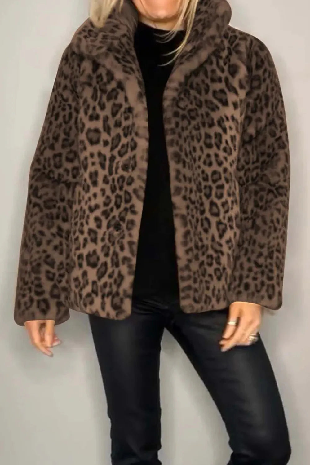 Full Size Leopard Furry Collared Neck Long Sleeve Coat worn by a model, featuring a leopard print design.