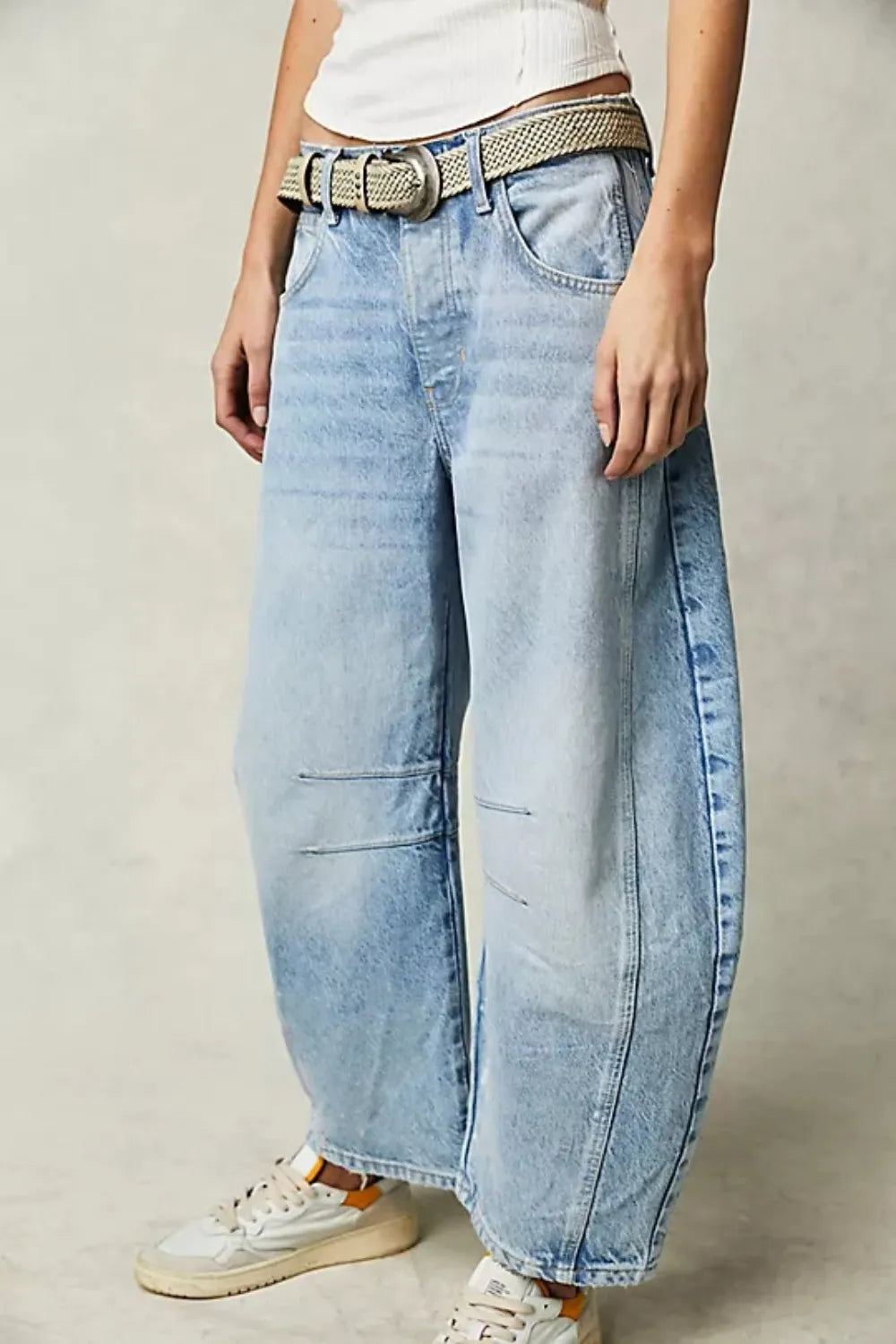 Wide Leg Jeans with Pockets in light blue, featuring a relaxed fit and stylish belt for casual wear.