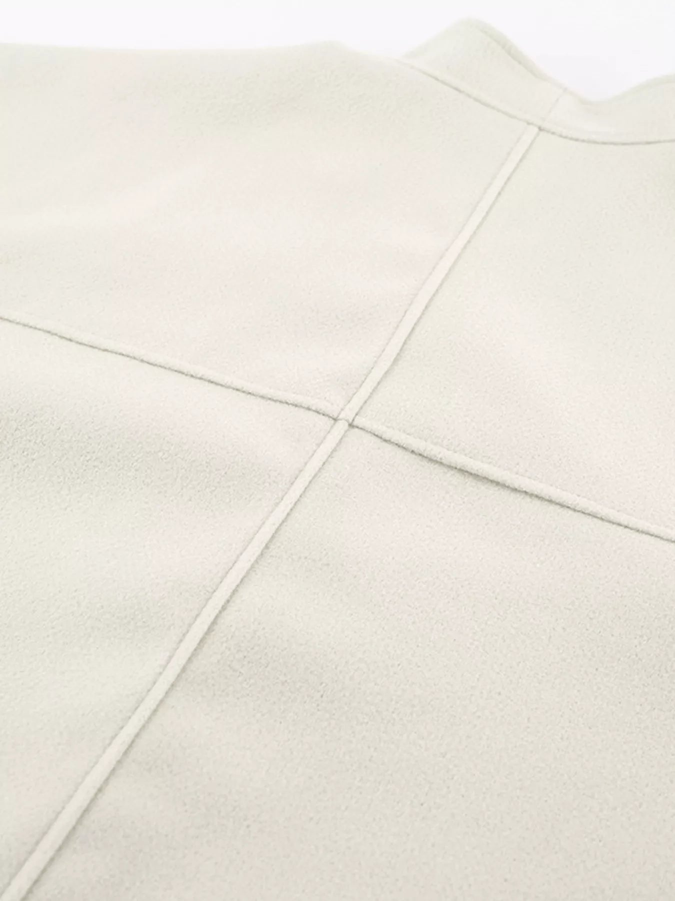 Close-up of the fabric texture and design of the Open Front Dropped Shoulder Outerwear for Women.