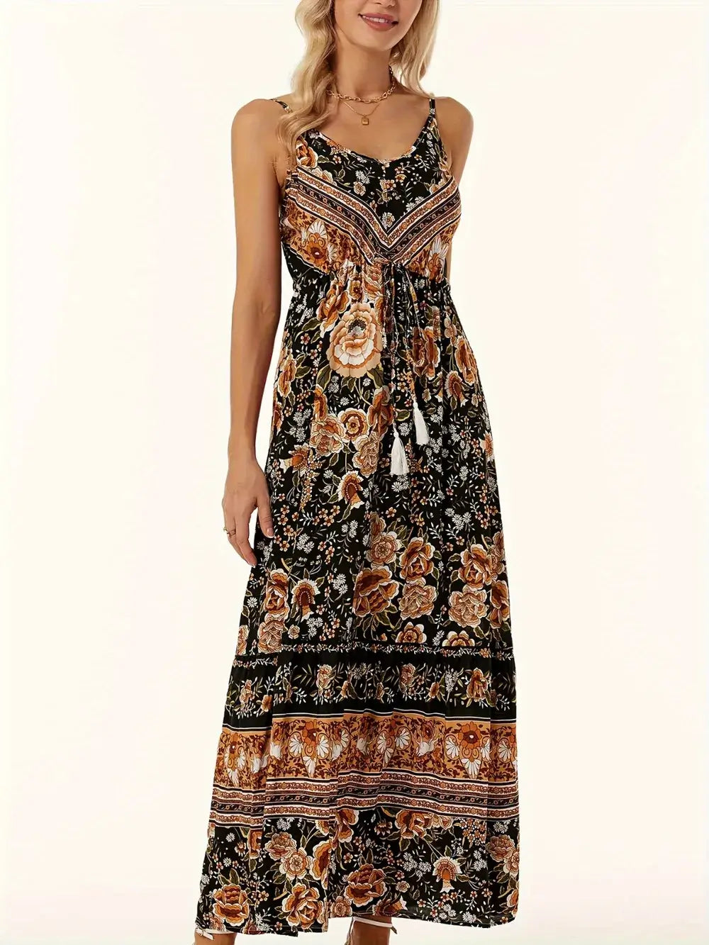 Model wearing Printed Scoop Neck Midi Cami Dress, showcasing floral print and sleeveless design for a chic look.