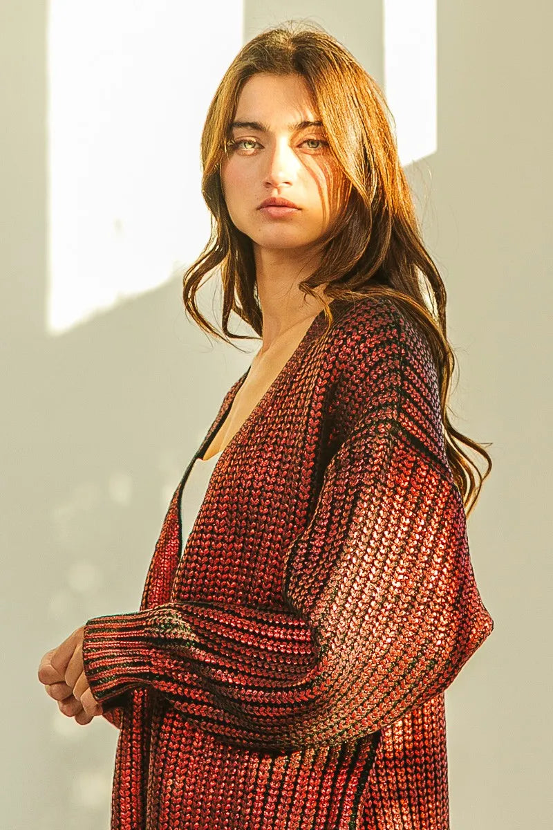 BiBi Metallic Knit V-neck Open Sweater Cardigan in vibrant red and black tones worn casually by a model.