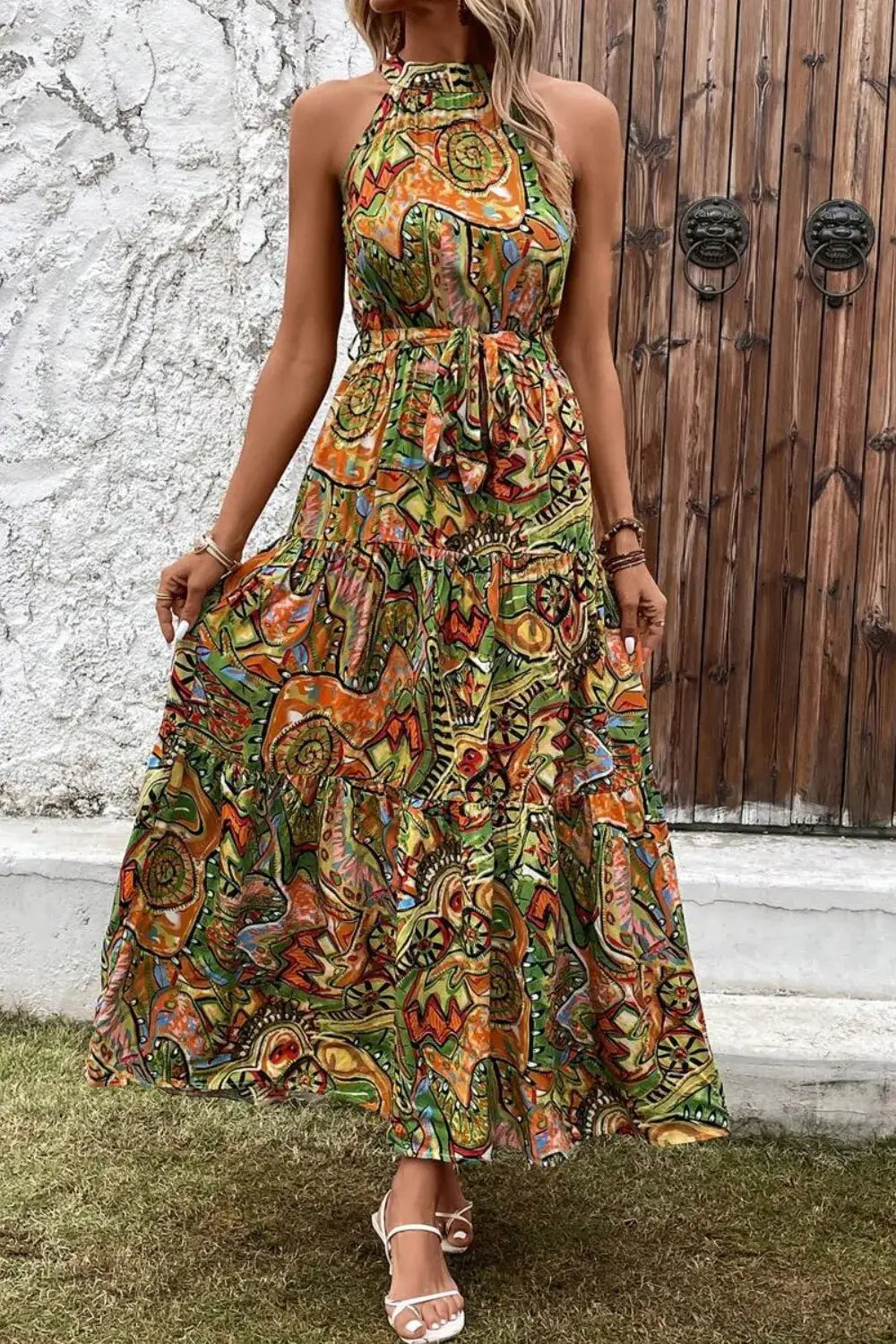 Tied Floral Sleeveless Dress – vibrant patterned maxi dress showcasing summer elegance and style.