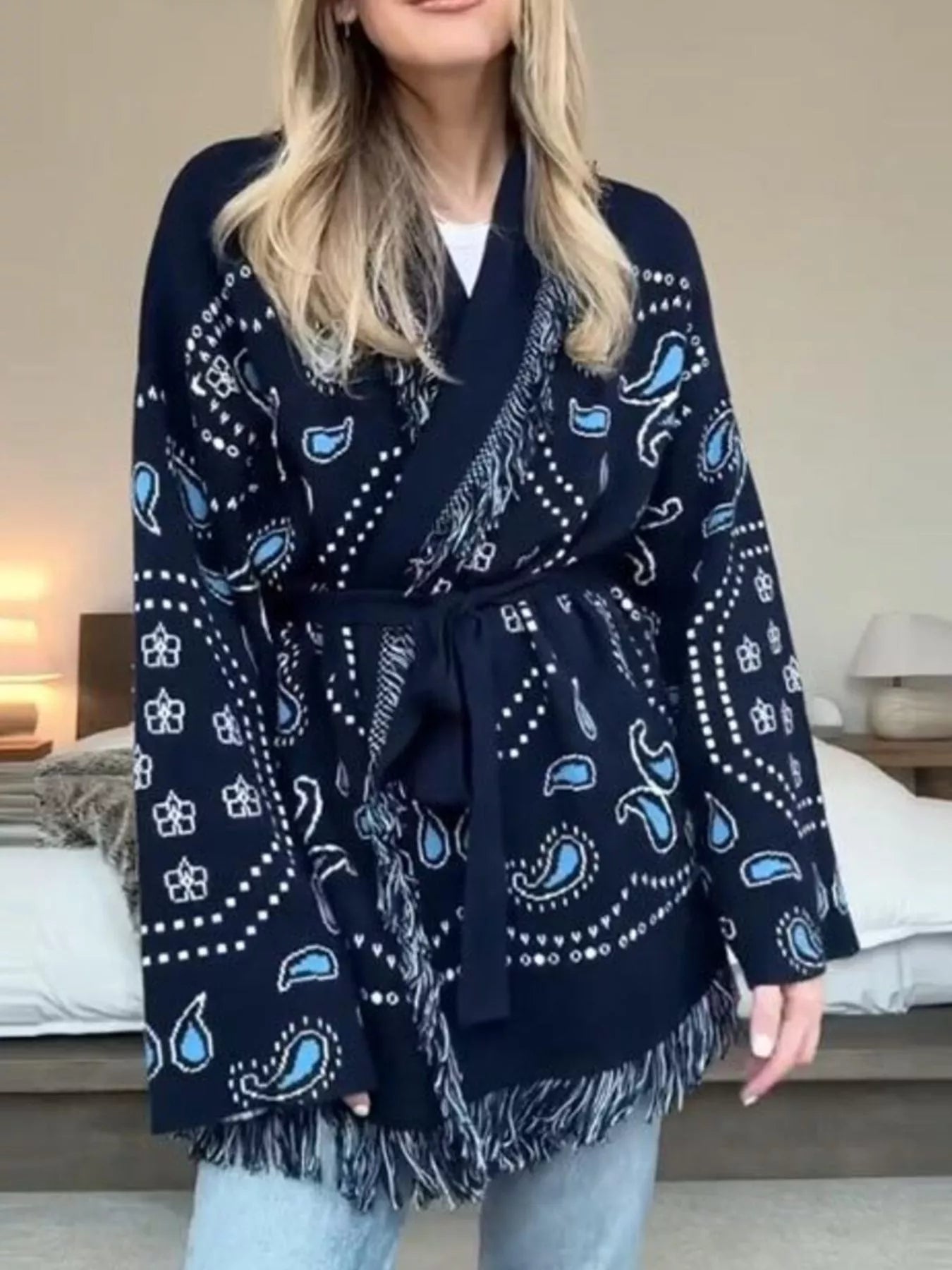 Model wearing Printed Fringe Long Sleeve Cardigan showcasing boho style and fringe details.