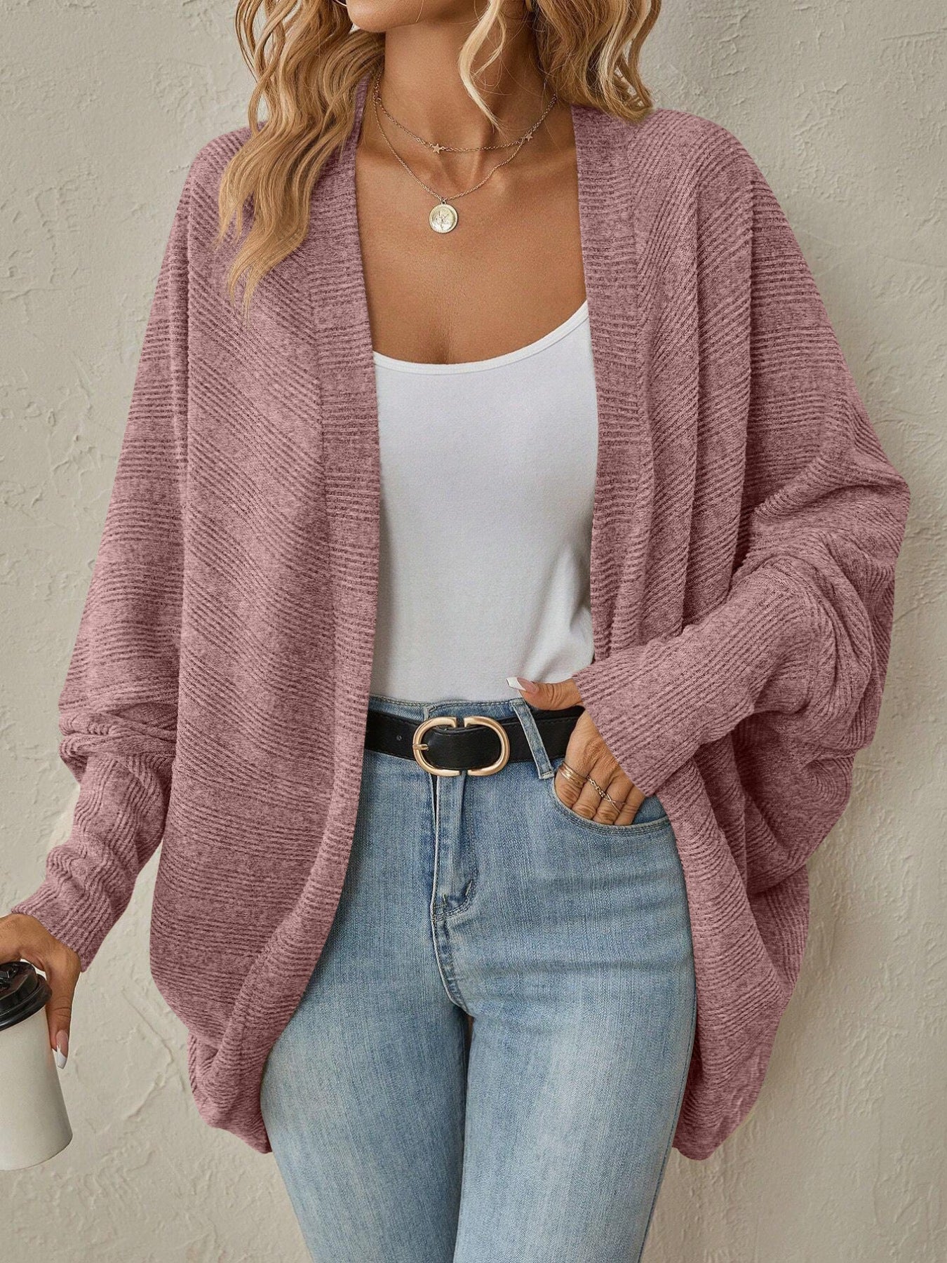 Open Front Batwing Sleeve Cardigan in dusty rose worn over a white tank top and blue jeans, showcasing lightweight and slightly stretchy fabric.