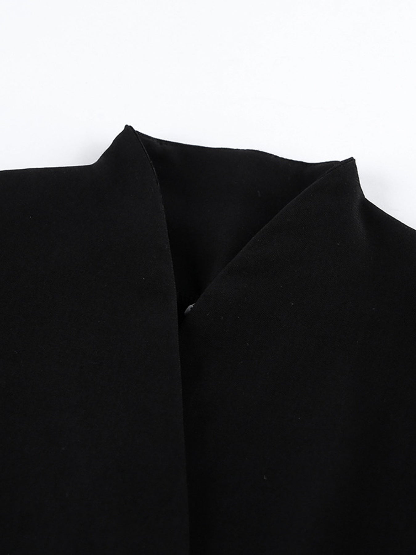 Pleated One Button Blazer Dress close-up of the collar detailing, showcasing elegant tailored style in black.