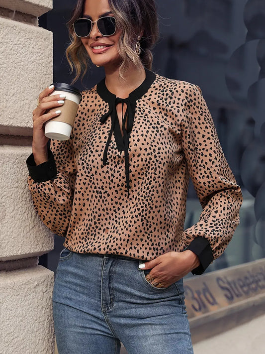 Animal Print Contrast Trim Tie Front Blouse – Bold & Stylish, featuring a tie front and leopard print design.