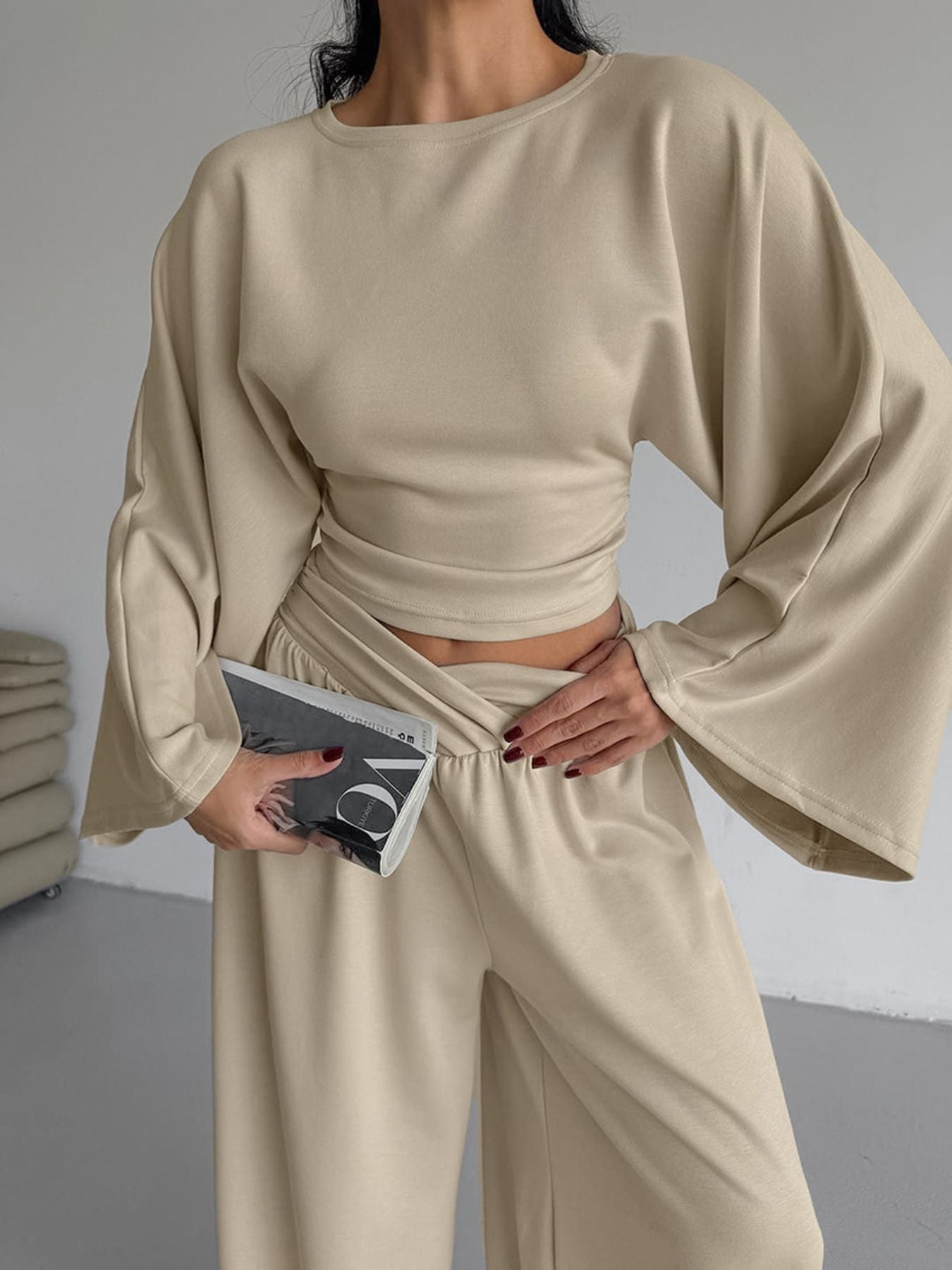 Round Neck Top and Wide Leg Pants Set on a model showcasing a chic two piece outfit in beige.